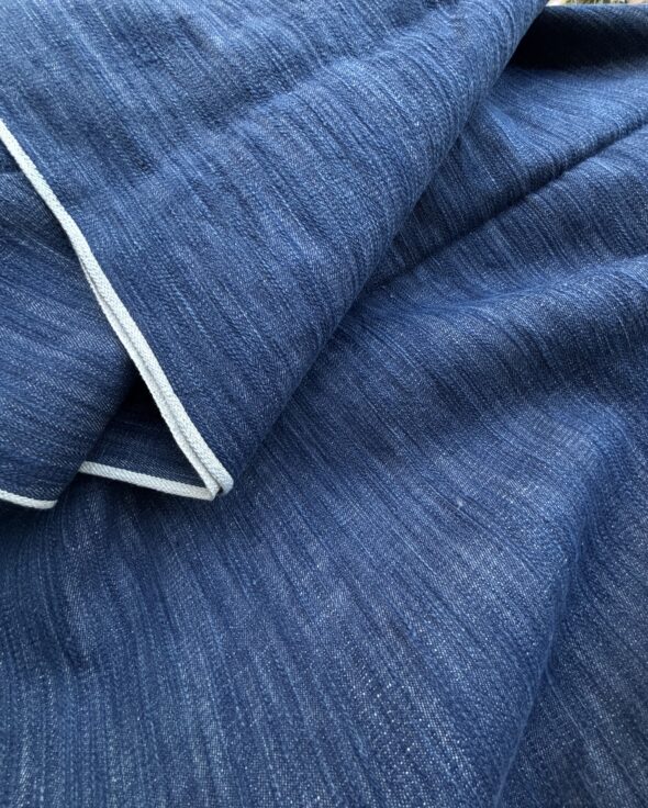 Surface of a Denim Fabric · Free Stock Photo